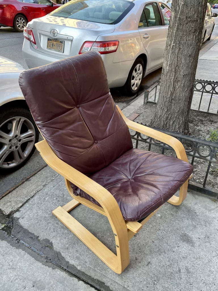 Discarded comfortable chair in New York City.