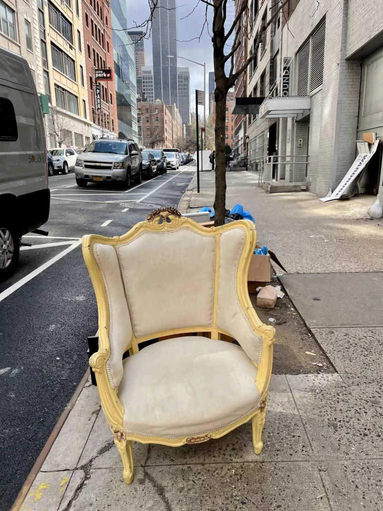 Discarded chair in New York City.